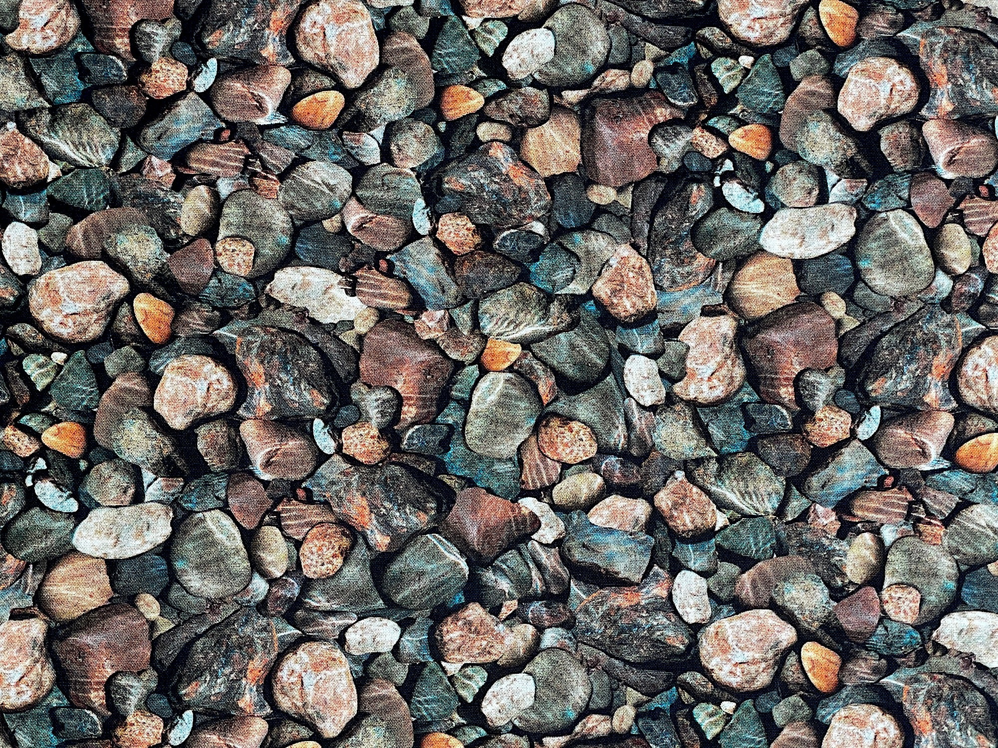 Cotton fabric covered with rocks.