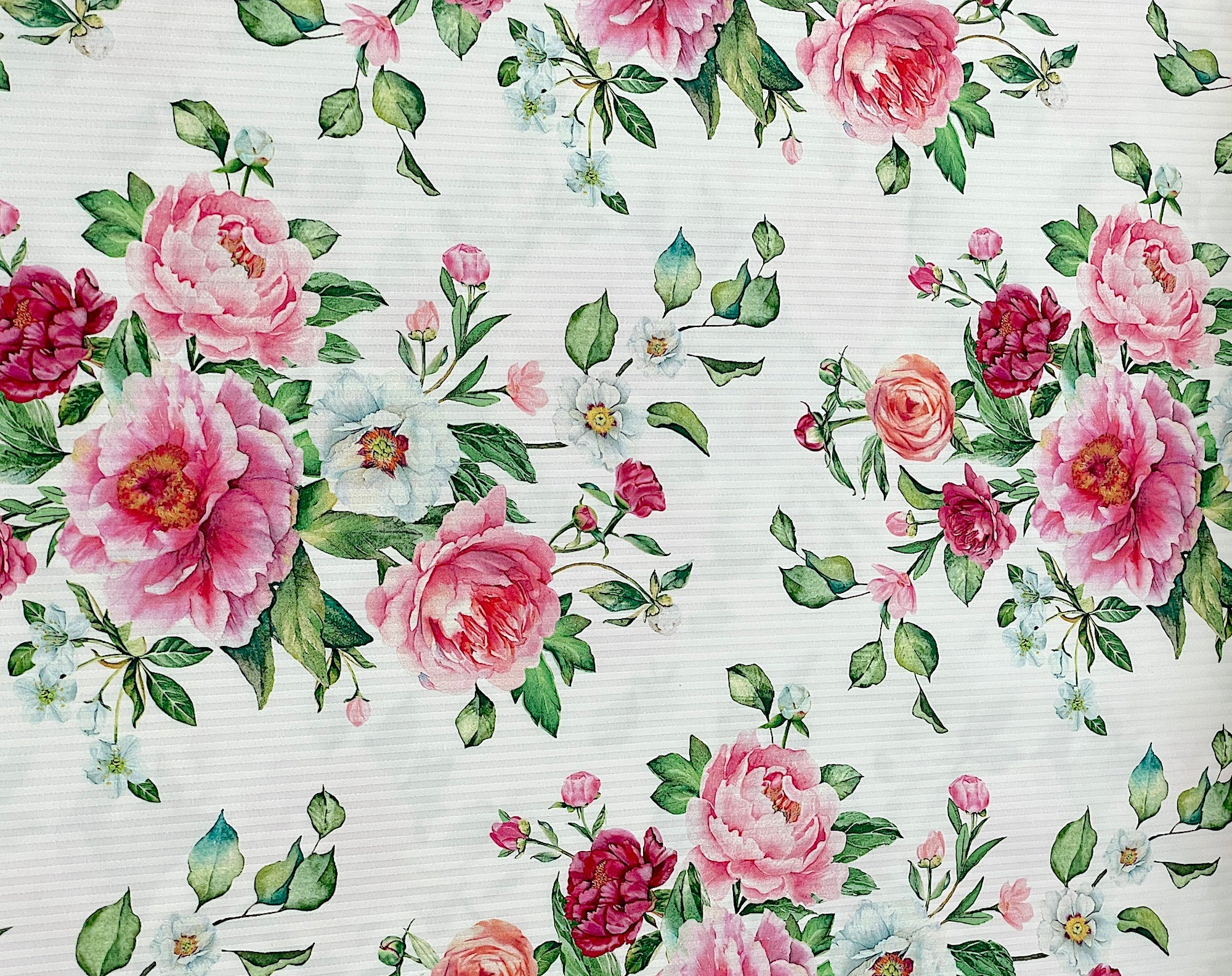 This white fabric is part of the Blush collection by Northcott Fabrics.&nbsp; You will find several shades of pink and white peonies.