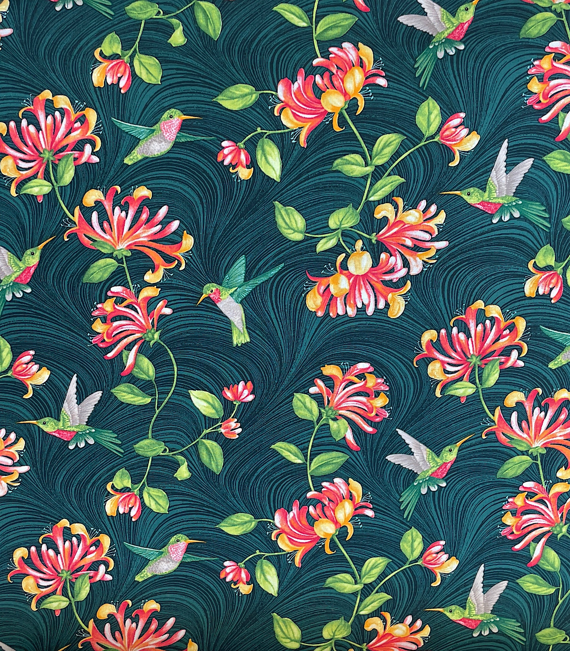 Teal Green cotton fabric covered with hummingbirds and flowers.