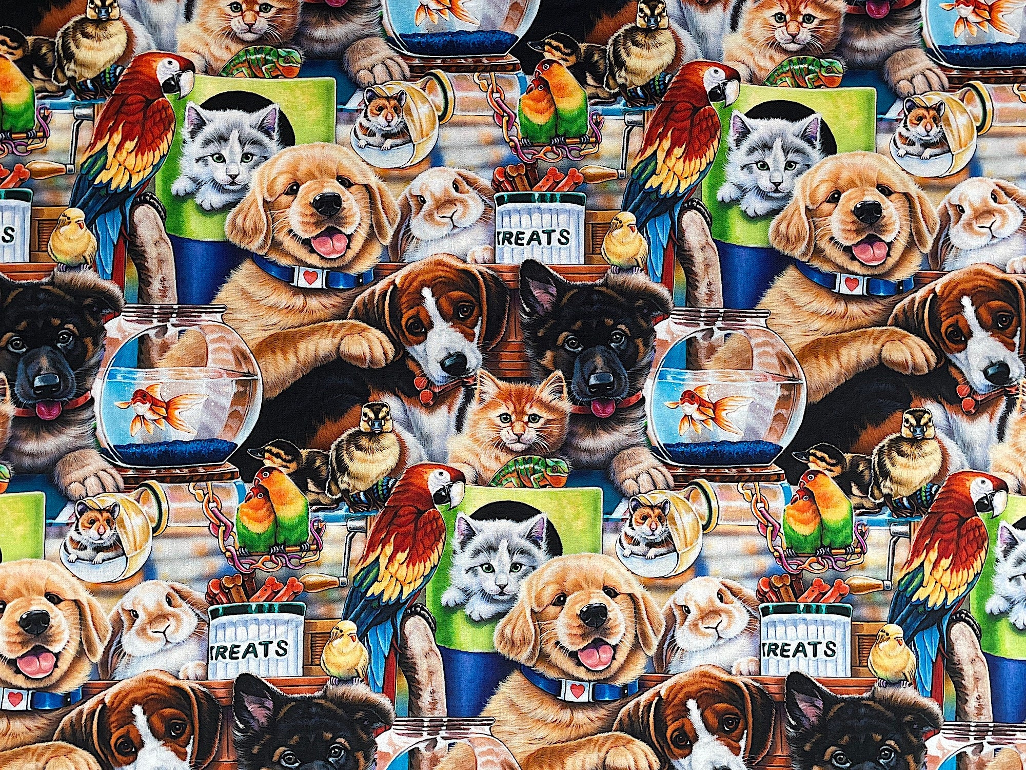 Here is an adorable fabric that is covered with small animals called "Pet Shop". There are dogs, cats, a parrots, a mouse, fish in fish bowls, a duck and love birds.