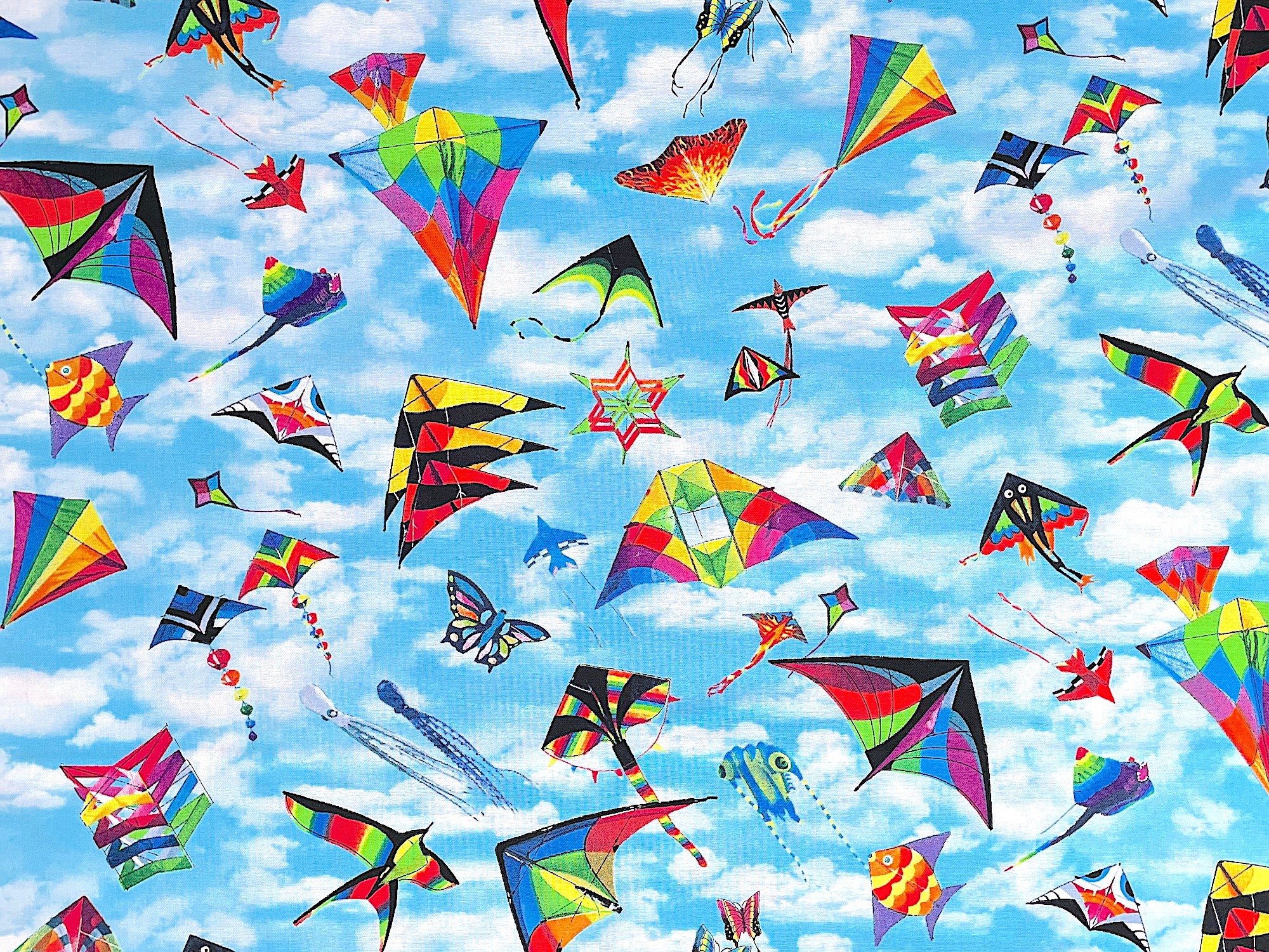 Cotton fabric covered with colorful kites.