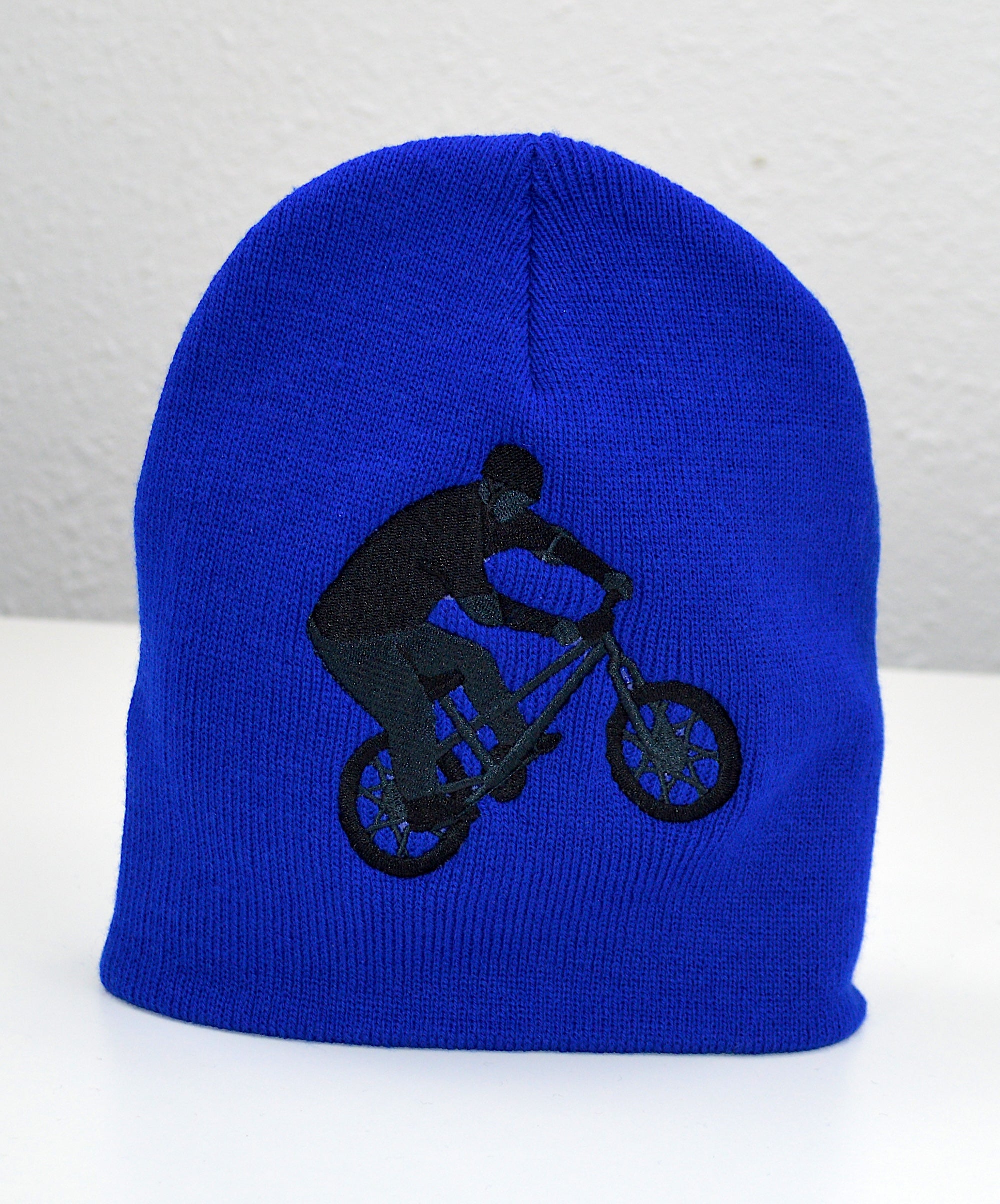 Bicycle Rider Embroidered Cuffless Beanie Hat
