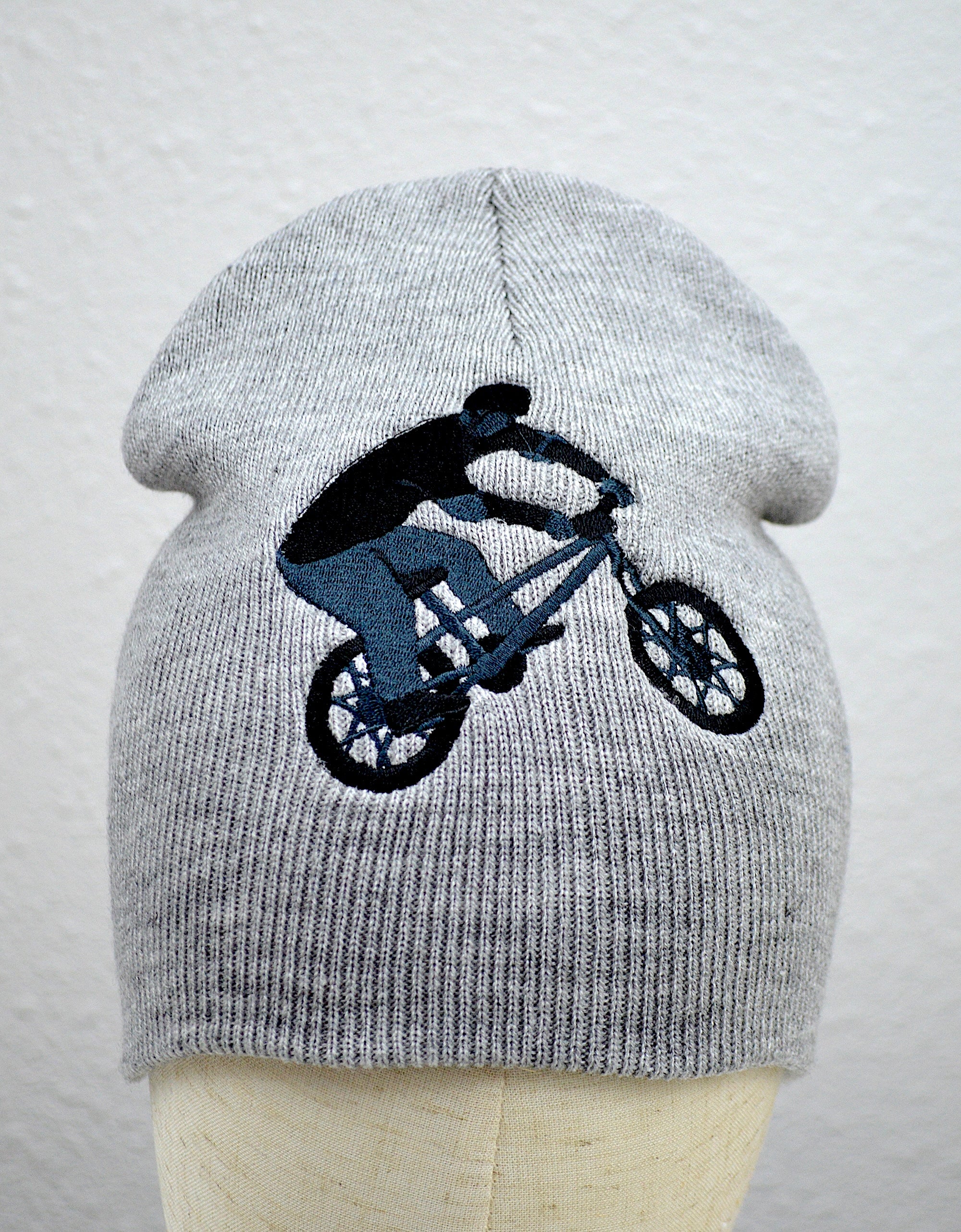 Bicycle Rider Embroidered Cuffless Beanie Hat
