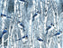 Cotton fabric covered with bluebirds sitting in trees in the winter.