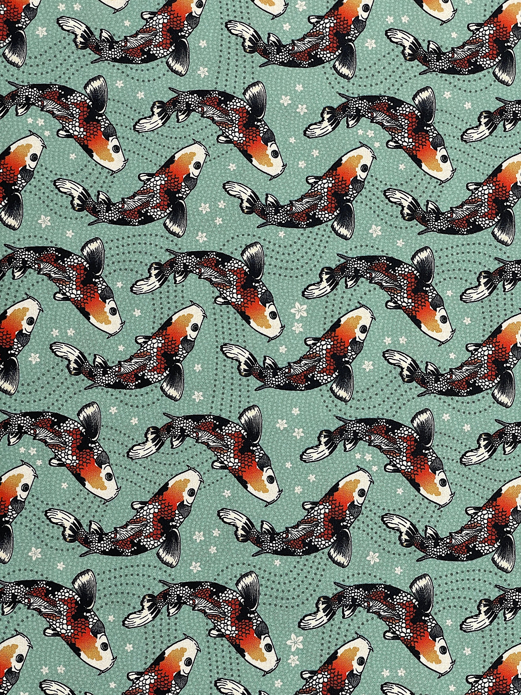 This fabric is part of the Kimonos &amp; Koi collection by Paintbrush Studios.&nbsp; This green fabric is covered with koi.