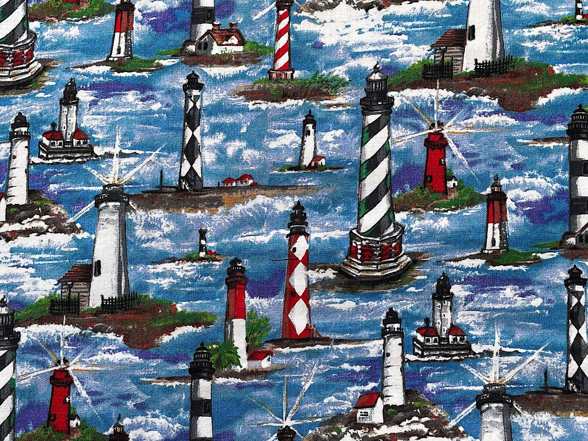 Coast waters with lighthouses of different colors, sizes and shapes.
