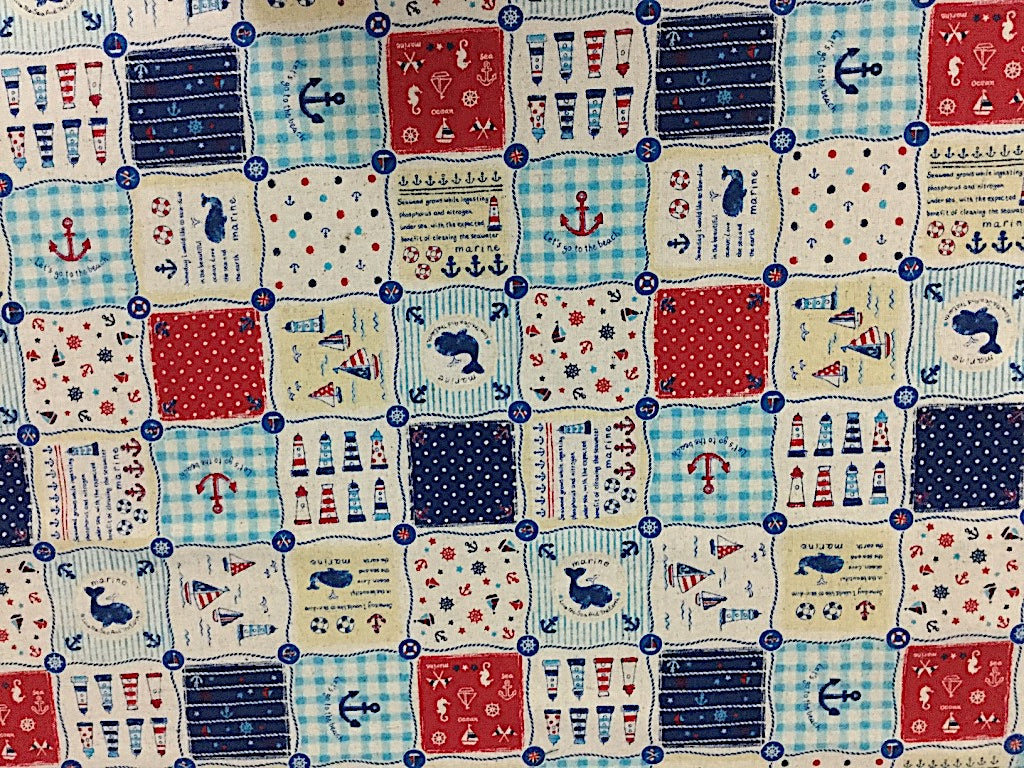 Anchors, sailboats, light houses and whales are on this Cotton-Linen Fabric.