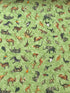 This fabric is called Safari Dreams animal toss.  This green cotton fabric is covered with zebras, elephants, giraffe, llamas, rhinos, tiers and other animals you would find in the zoo.