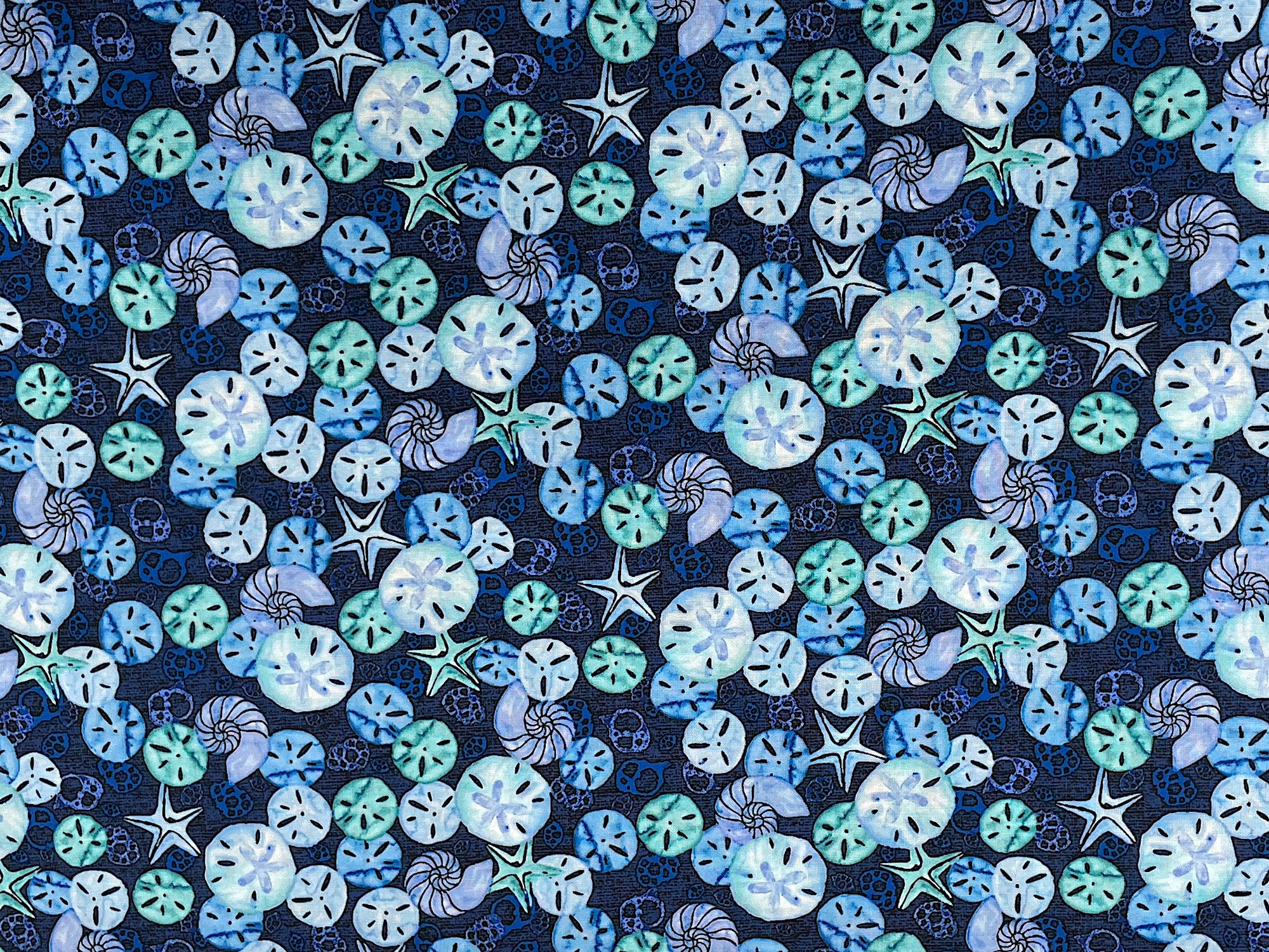 This blue cotton fabric is part of The Sea is Calling collection.&nbsp; This fabric is covered with, starfish and sand dollars.