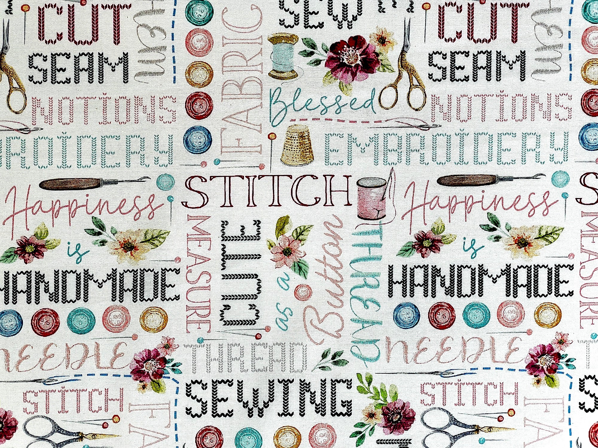 This fabric is part of the Sew in Love Collection by Rockstar Sewing.  This white cotton fabric is covered with sewing sayings such as sewing, cute, handmade, thread, buttons, embroidery and more.  You will also see buttons, seam rippers, and thread.
