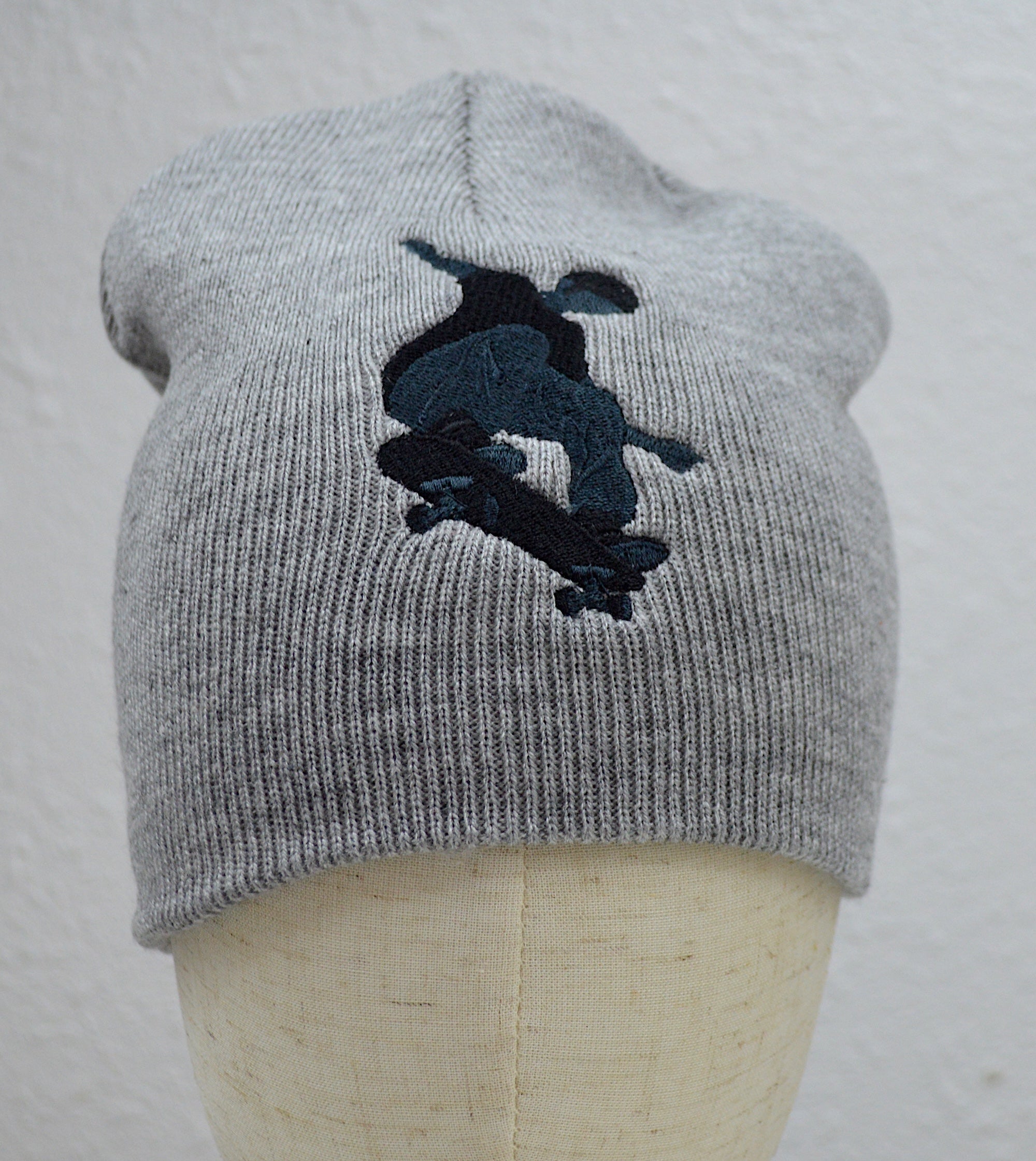 Skateboarder Embroidered Cuffless Beanie Hat