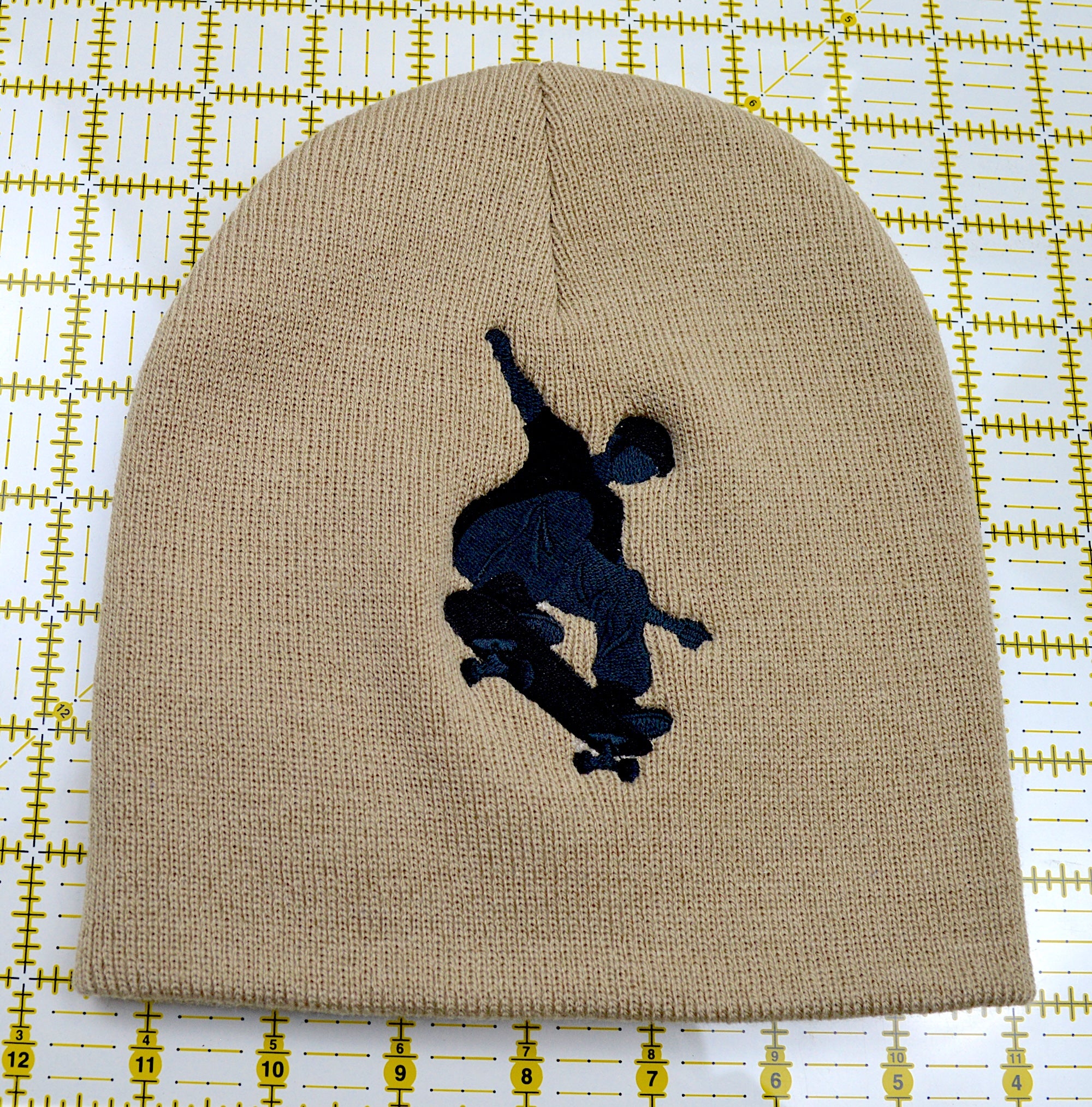 Skateboarder Embroidered Cuffless Beanie Hat