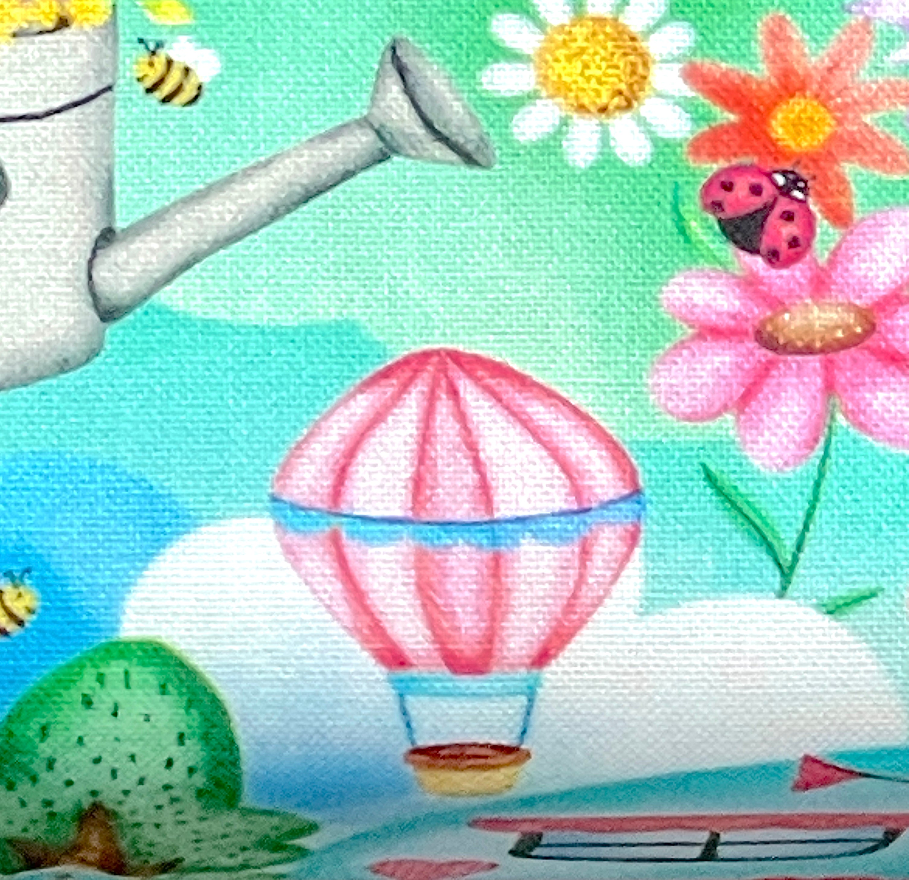 Close up of a hot air balloon, flowers, ladybug and  more.