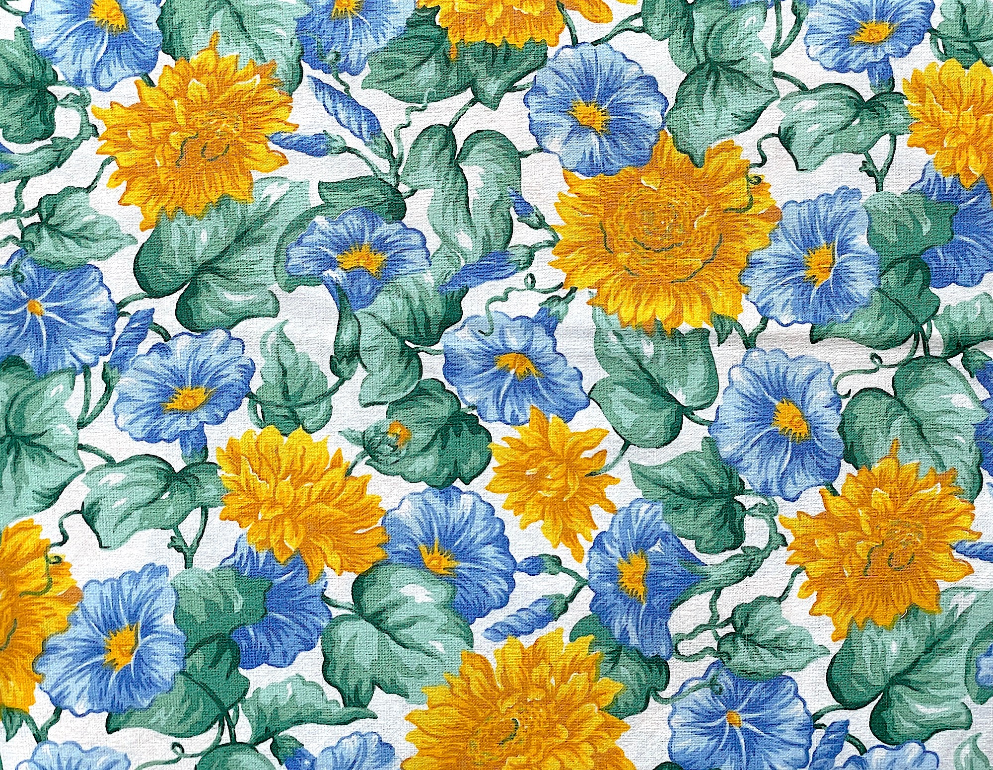 Yellow flowers surrounded by morning glories with the vine intertwined throughout the design.