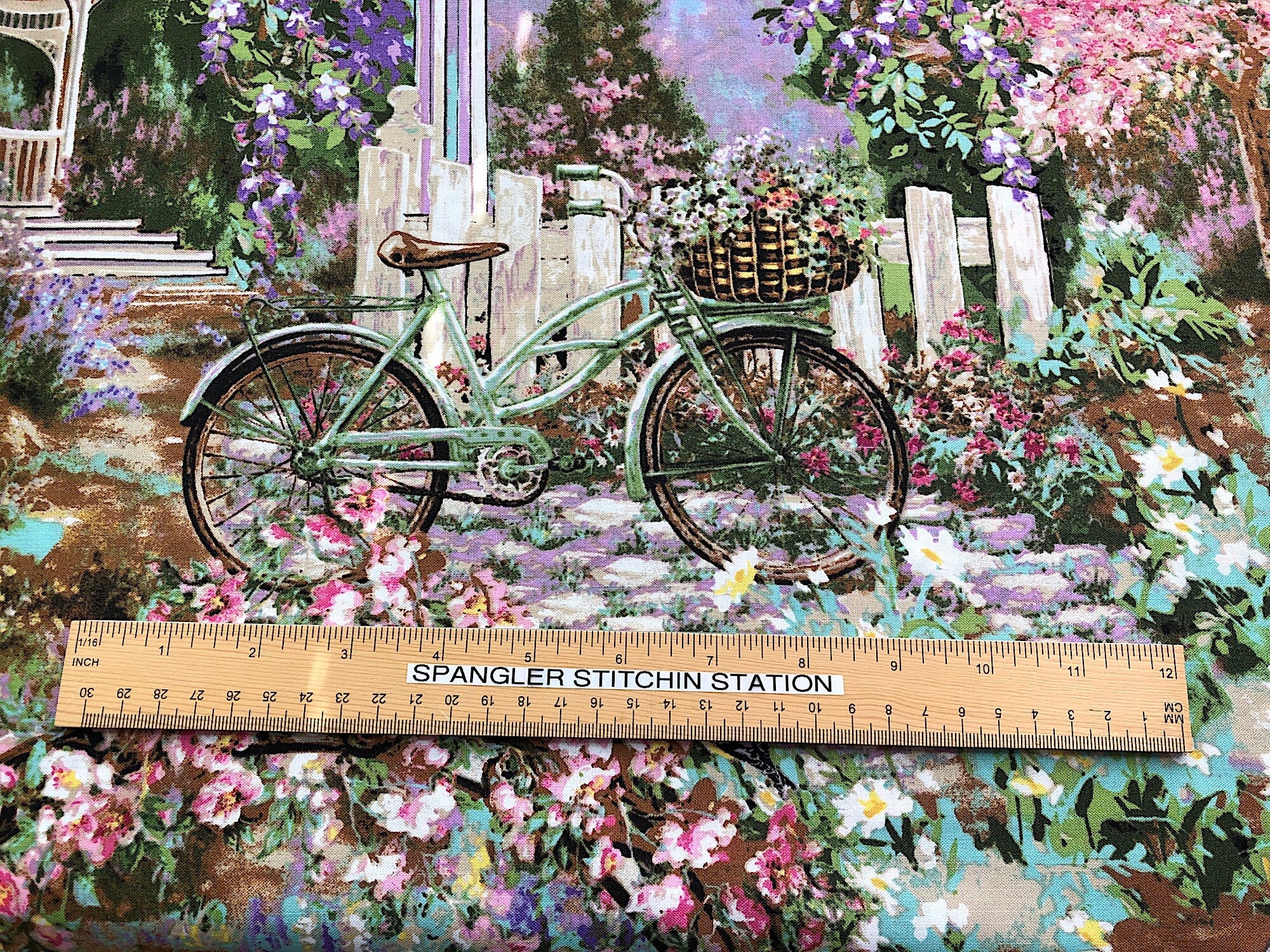 Ruler on fabric to show the size of the bike.