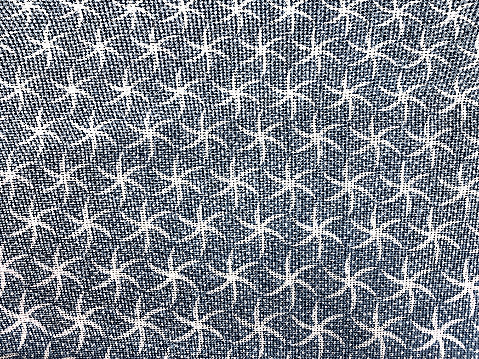 This fabric is part of the Turtle Bay collection and has starfish on a blue background