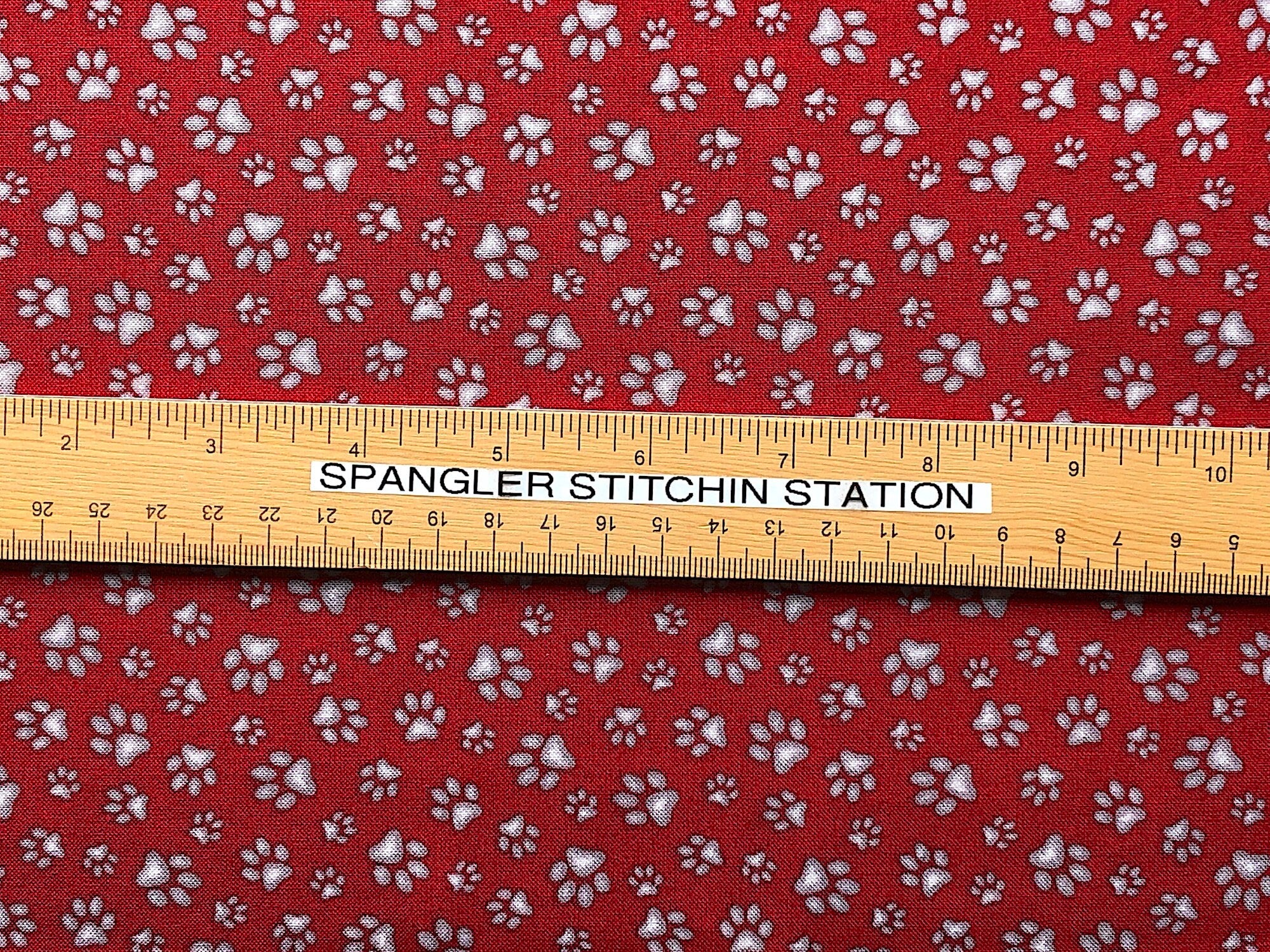 Ruler on fabric to show sizing.