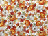 This fabric is called Fall for Autumn Harvest/Gold. This white fabric is covered with orange and white pumpkins and fall leaves in shades of orange, yellow and green. Some of the leaves have gold on them.
