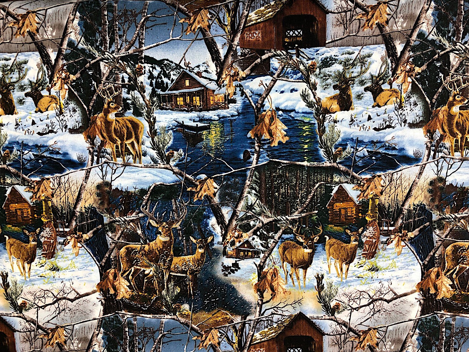 Cotton fabric covered with water, deer, cabins, trees and more