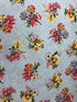 Cotton fabric covered with bouquets of flowers.