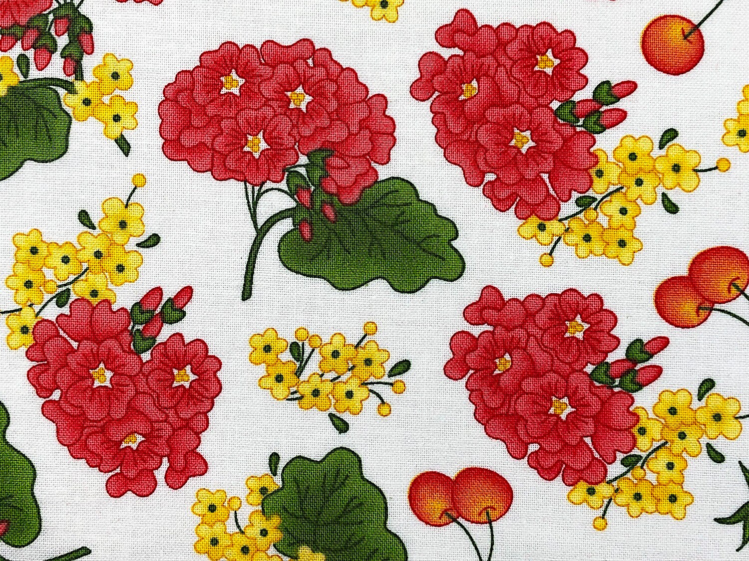 Part of the Back Porch Celebration collection. Peach and yellow flowers with green leaves on a white background