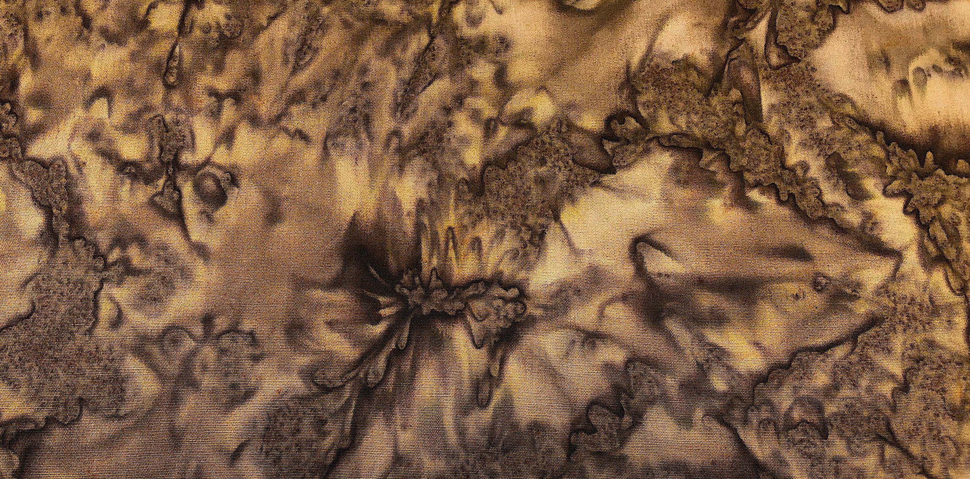 Cotton fabric covered in shades of brown and beige.