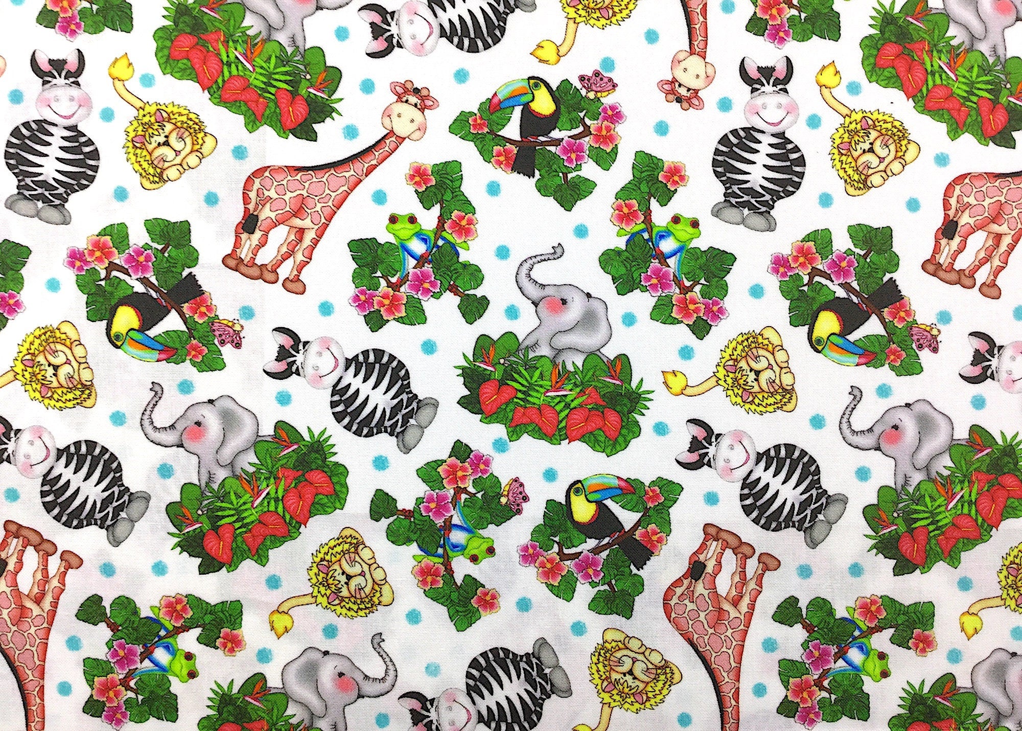 This fabric is called Bazoople Tossed Animal and has zebras, tigers, elephants, plants and more on a white background.