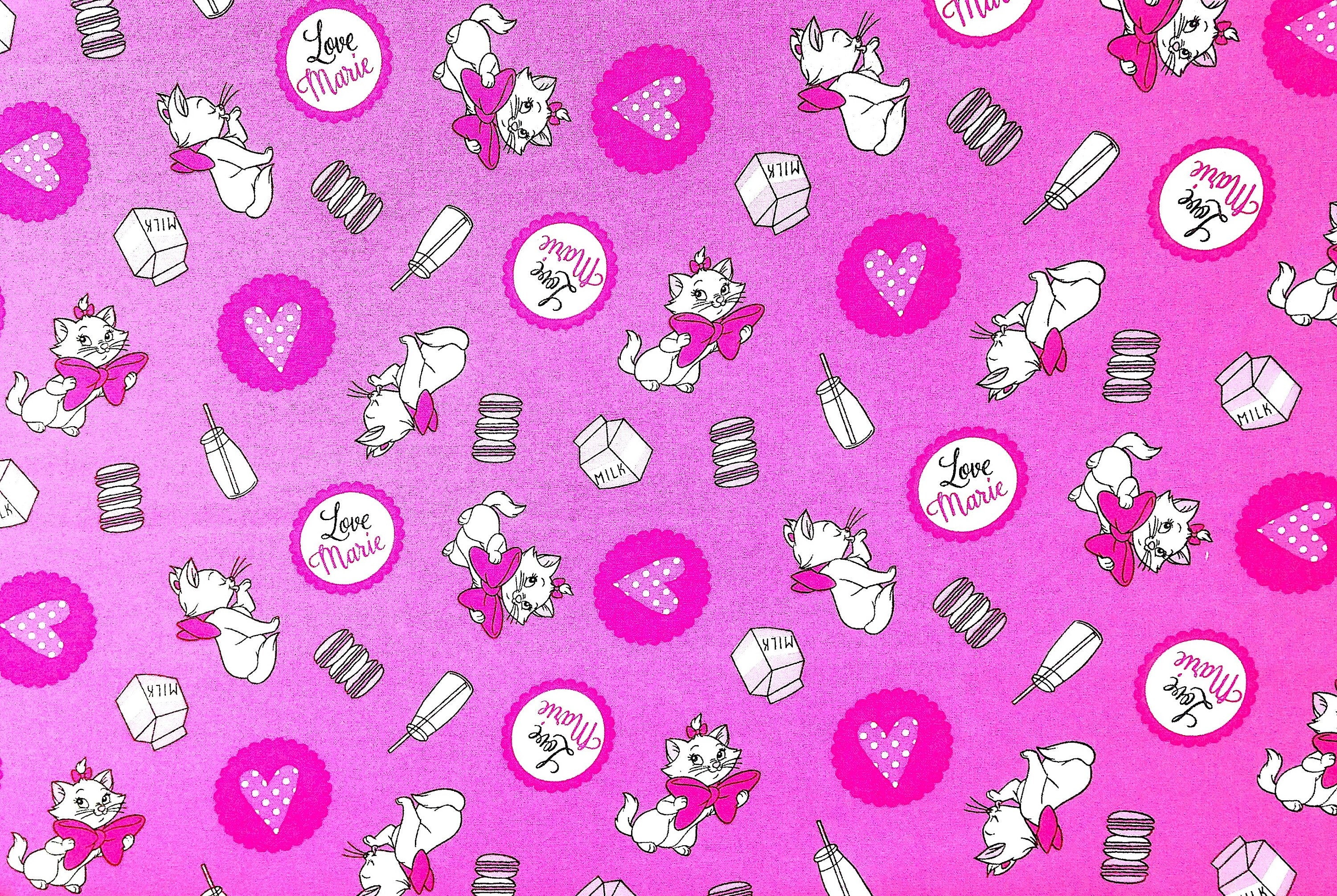 This Disney fabric features Marie the cat who loves milk