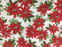 Red Poinsettias and green leaves on a white snowflake covered background.