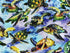 This fabric is part of The Reef collection and is covered with turtles swimming in water.