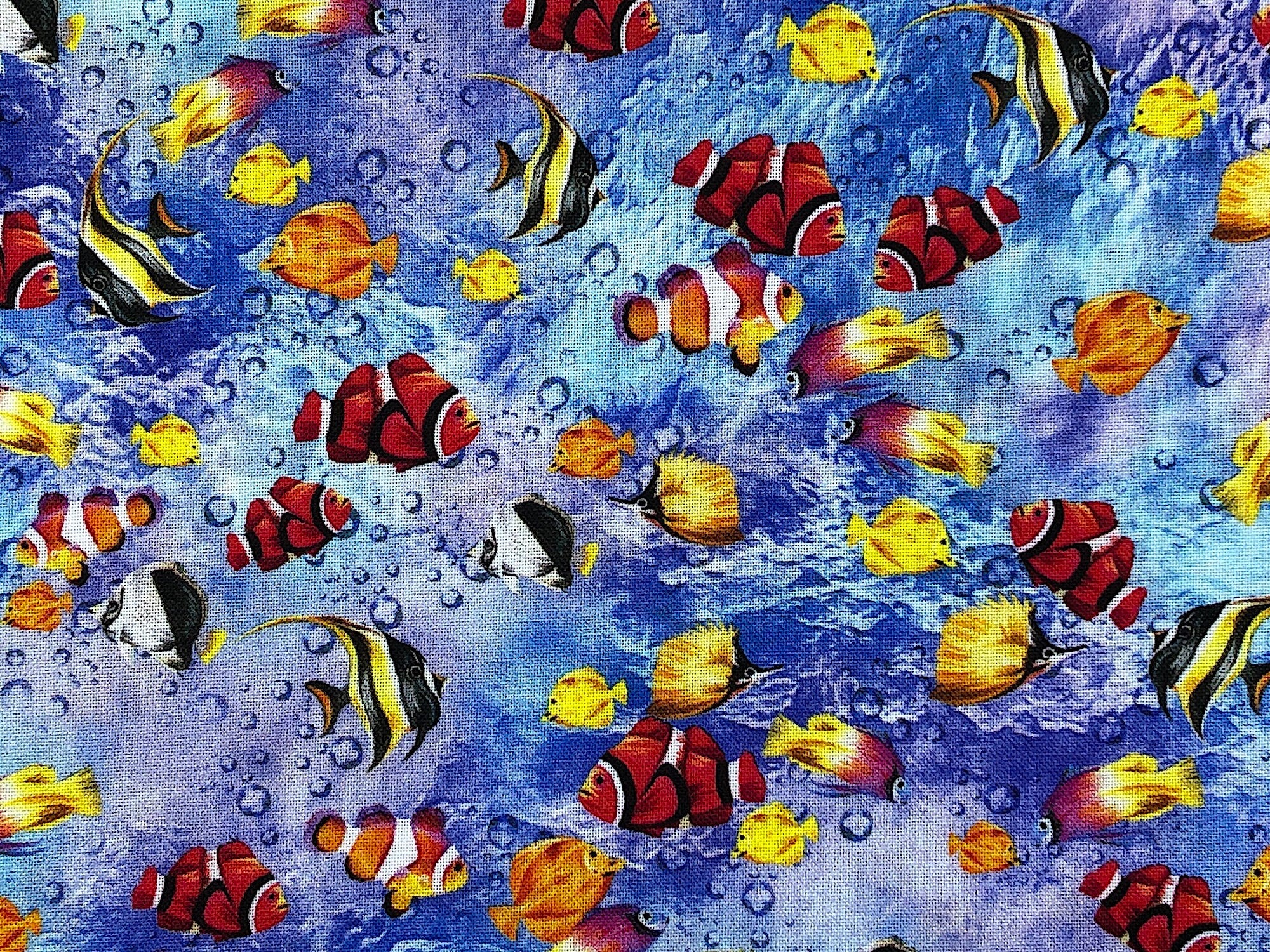 This fabric is part of the Reef Collection and is covered with angel fish, clown fish and more