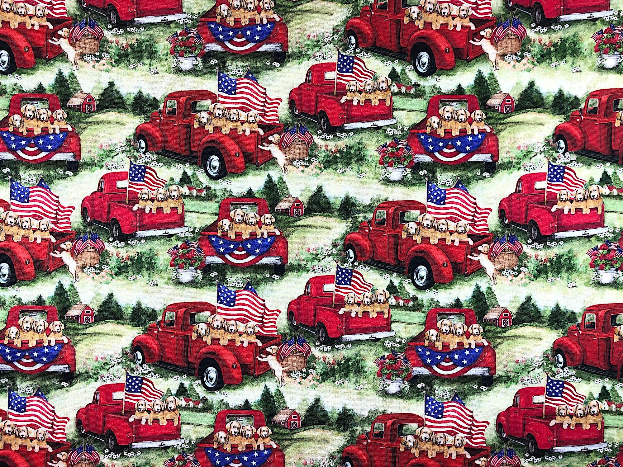 This fabric is covered with dogs in red trucks. There are also pots of geraniums throughout the pattern. Various styles of flags are in the trucks, in the pots and hanging off the trucks.