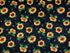 This fabric is called Sundance Meadow and is covered with sunflowers and bees. The background is black.