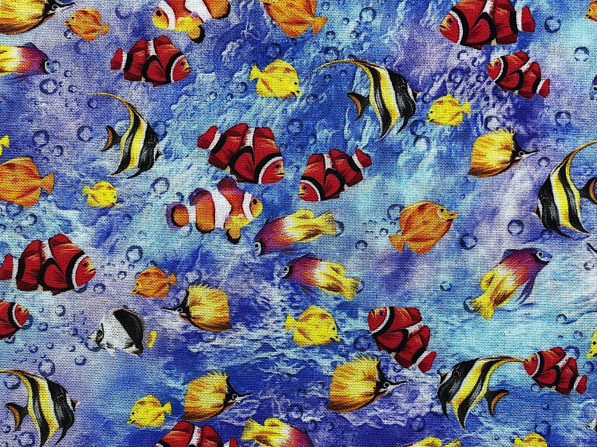 This fabric is part of the Reef Collection and is covered with angel fish, clown fish and more