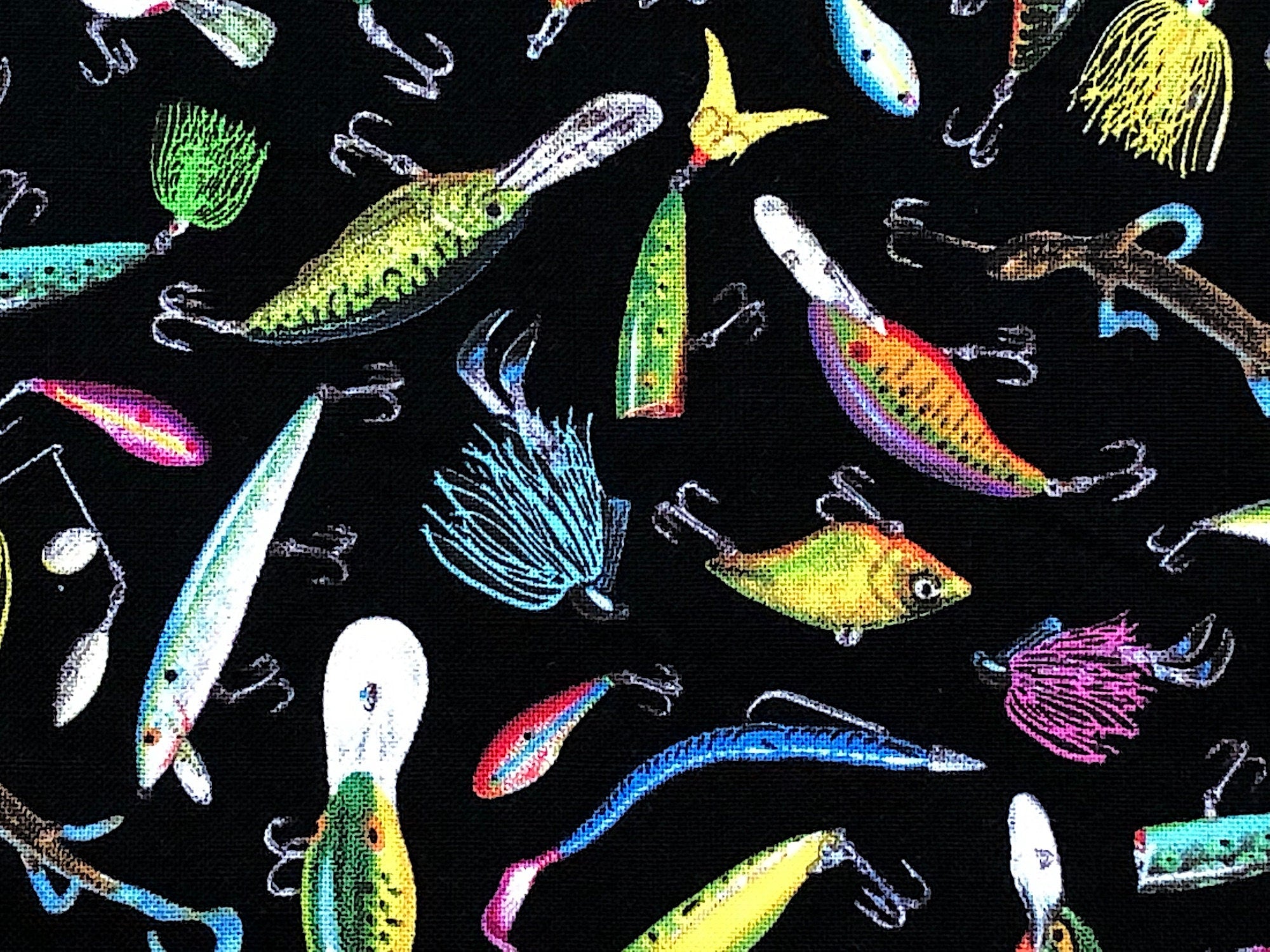 Close up of fishing lures in all colors.