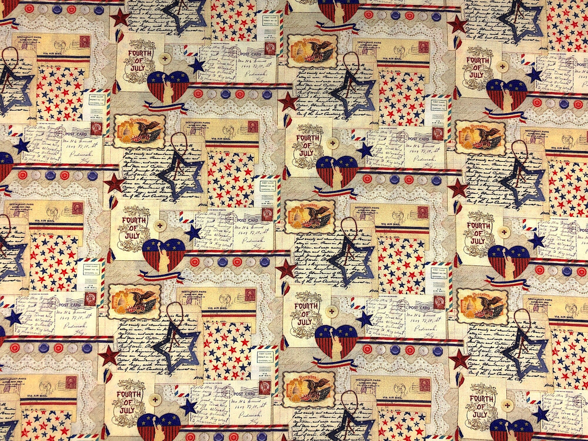 This fabric is called Patriotic Thoughts and is covered with Hearts, stars buttons, eagles in red white and blue. There are postcards with script throughout this fabric.