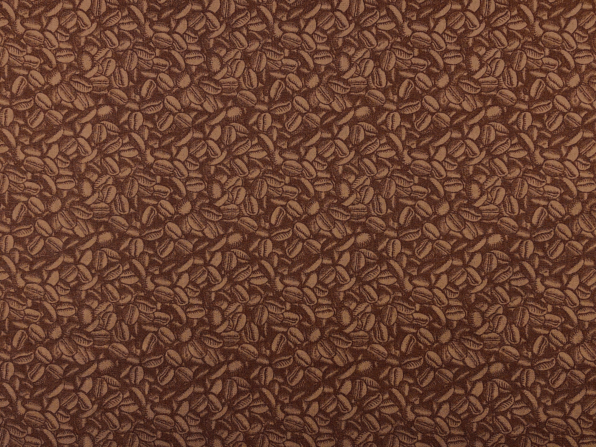 This fabric is called Dark Roast and is covered with coffee beans.