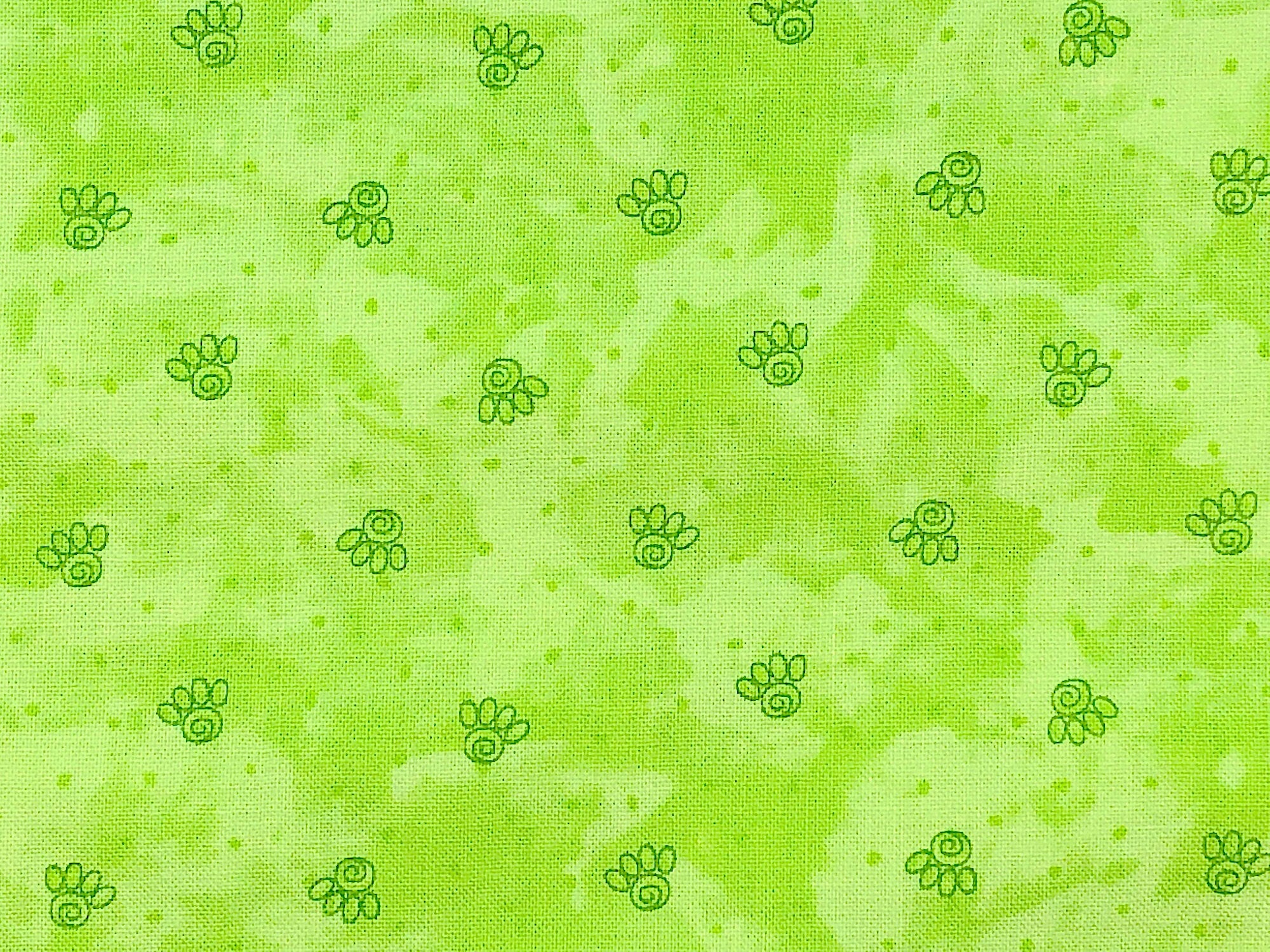 This fabric is called Happy Catz and is covered with green paw prints.