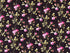 This fabric is called Savannah Classics and has shades of pink and red roses on a brown background.