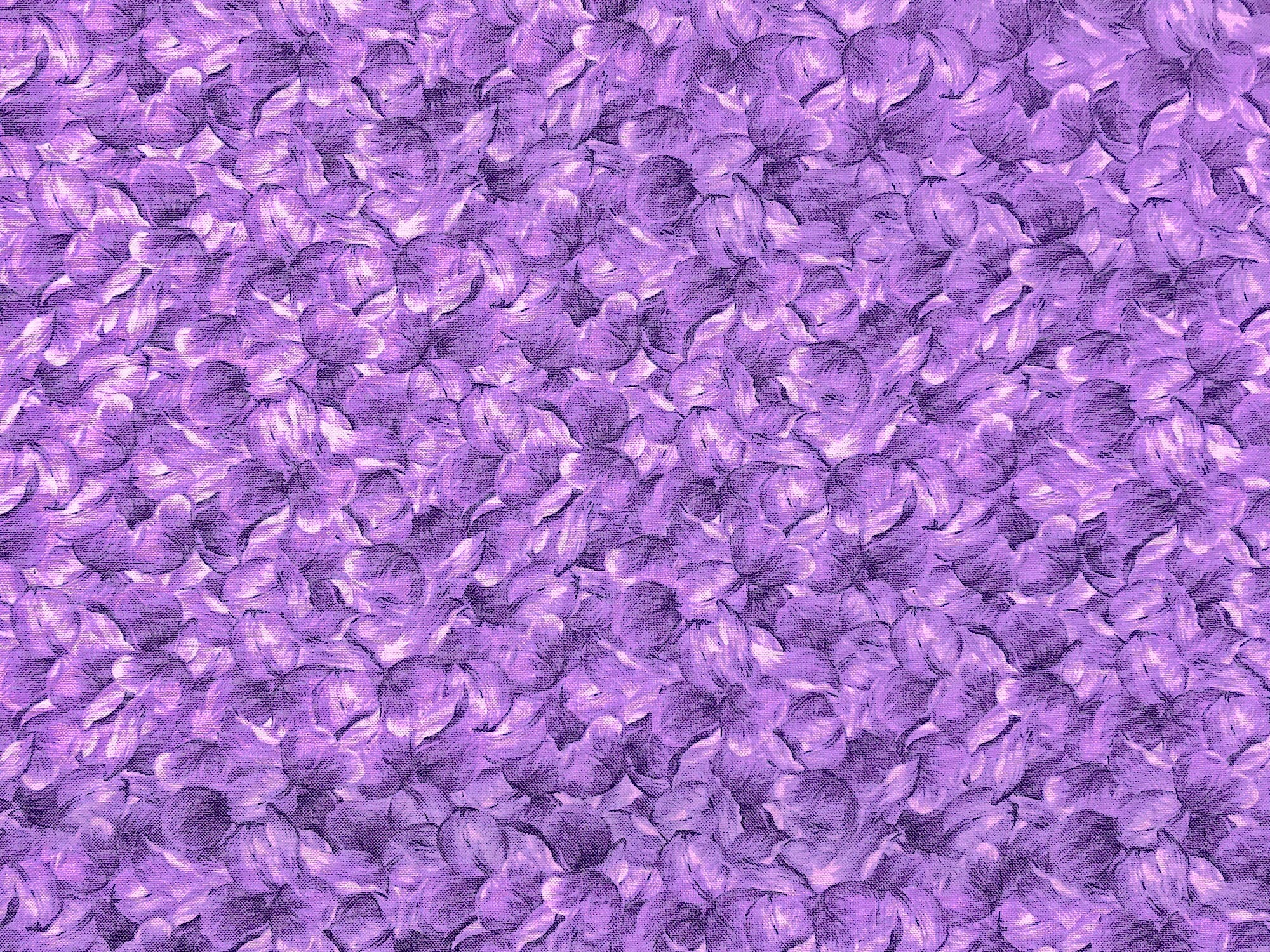 This fabric is a part of the Elegant Blooms collection and is covered in flower petals