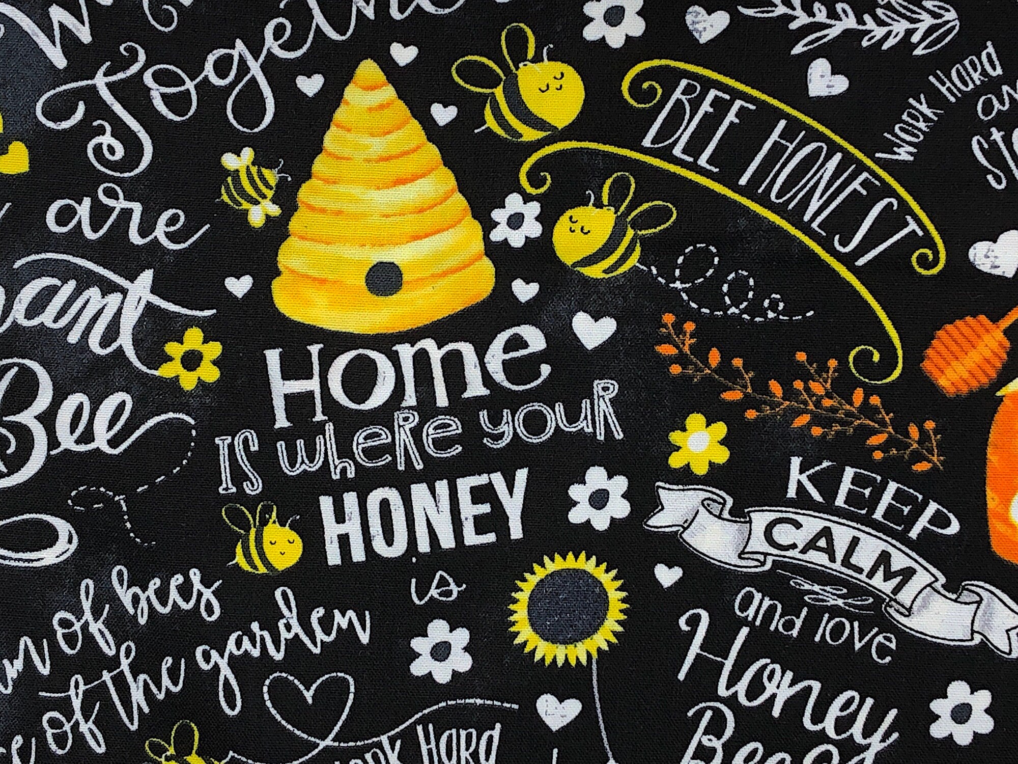 Close up of bees and sayings such as home is where your honey, keep calm and more.