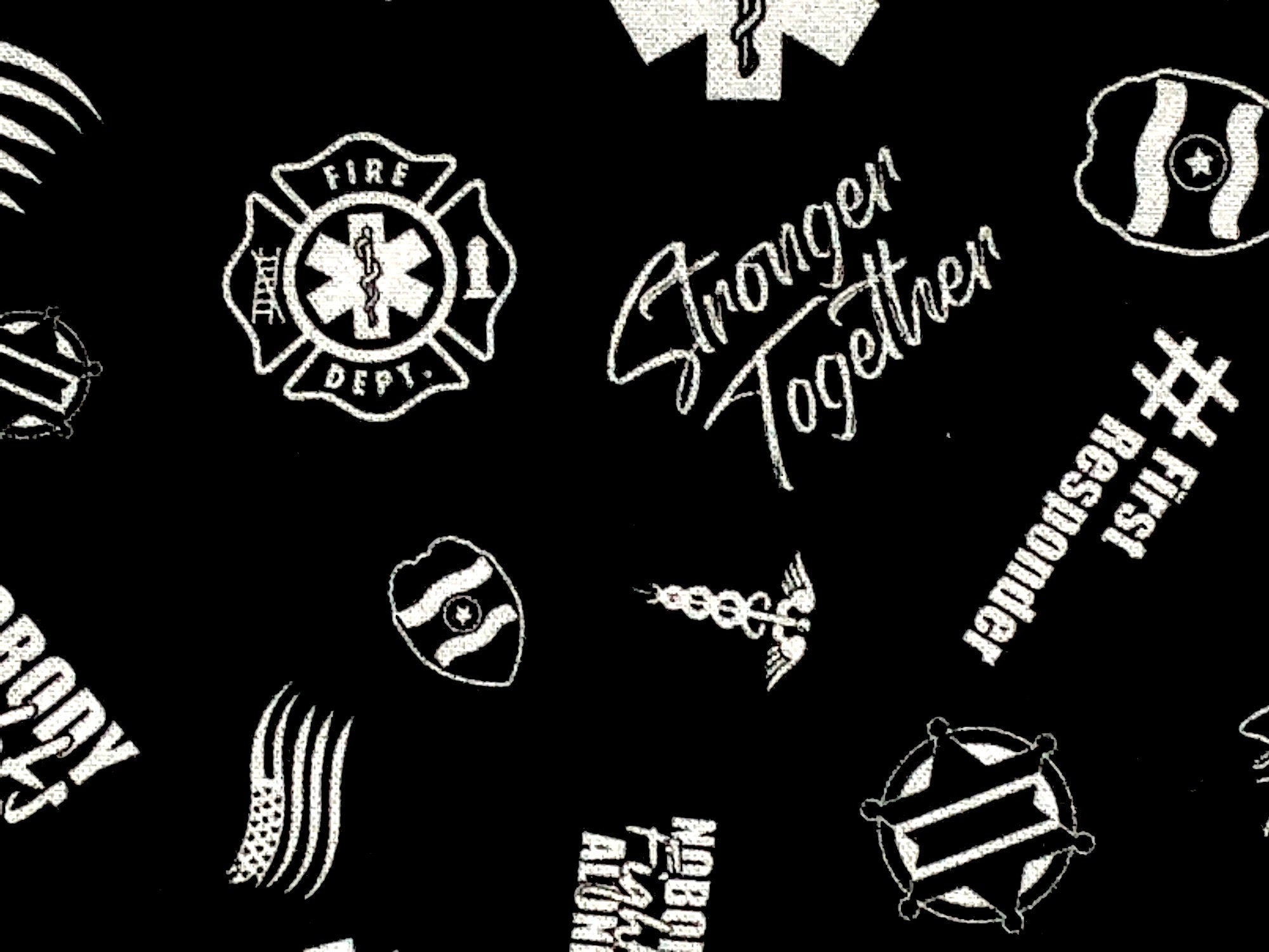 Close up of stronger together and other symbols.