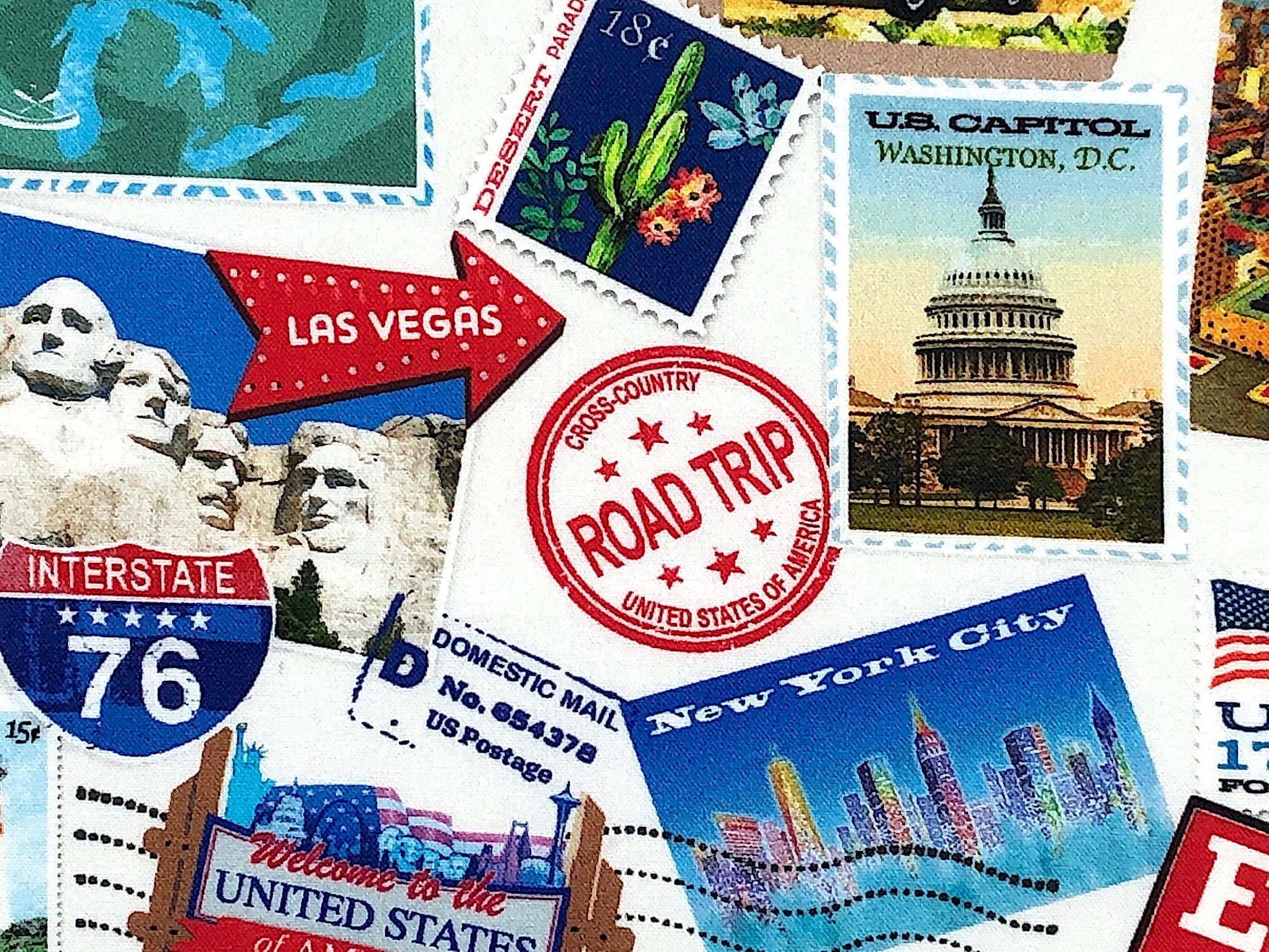 Close up of post cards, stamps and more.
