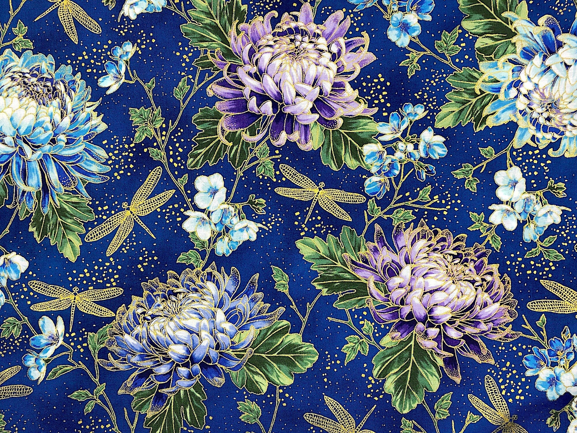 Blue cotton fabric covered with blue and purple hydrangeas and gold dragonflies.