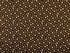 This fabric is part of the Hats for Cats collection. This brown fabric is covered with paw prints which are cream, dark brown or light brown.