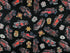 This black fabric is part of the 5 Alarm collection and is covered with firetrucks and shields.