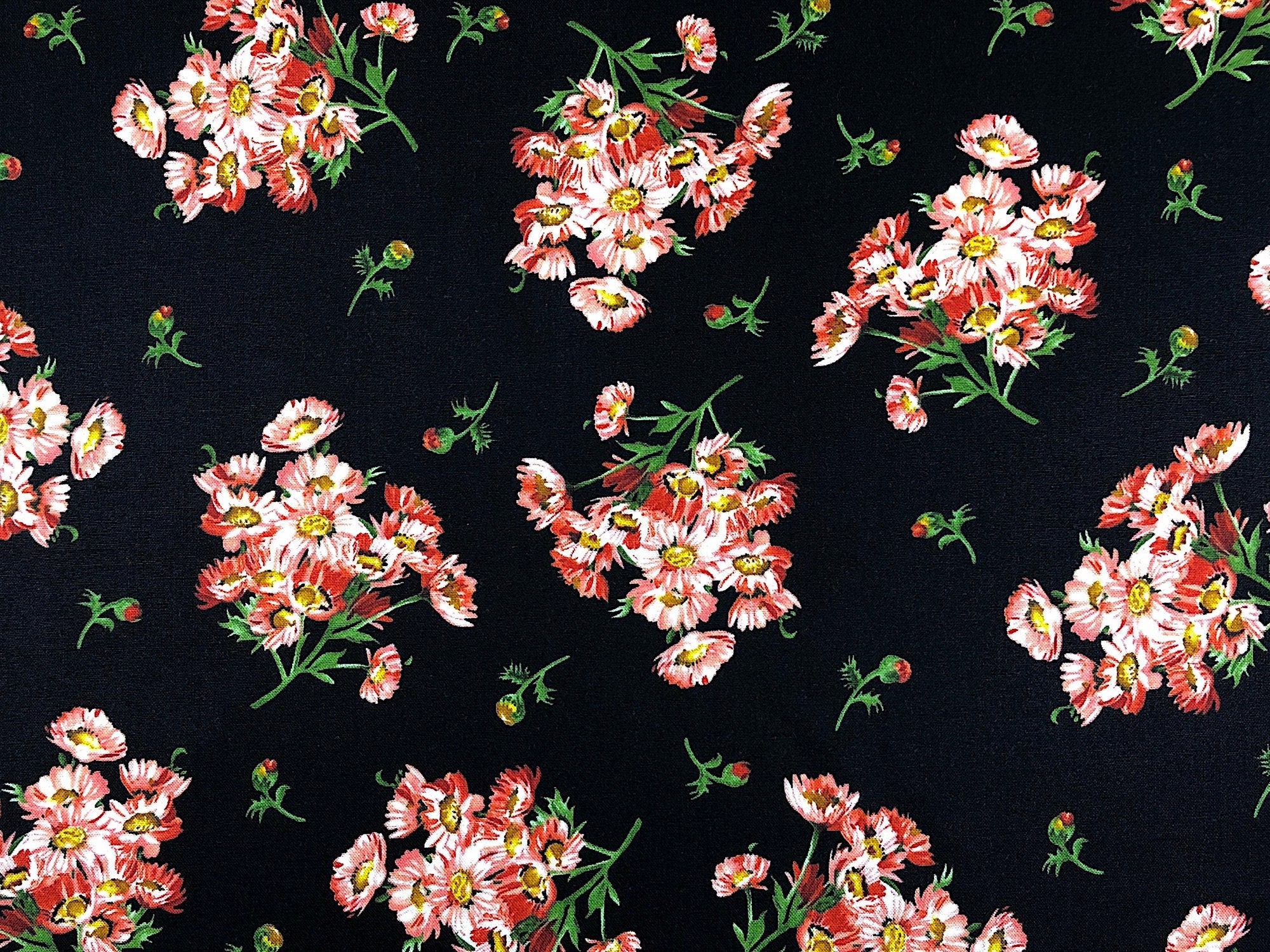 This black fabric is called Prose and is covered with peach colored flowers