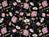 Black cotton fabric covered with nurse hats, bags, stethoscopes, band aids and more