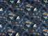 Indigo blue cotton fabric covered with yellow, green and red vintage cars.