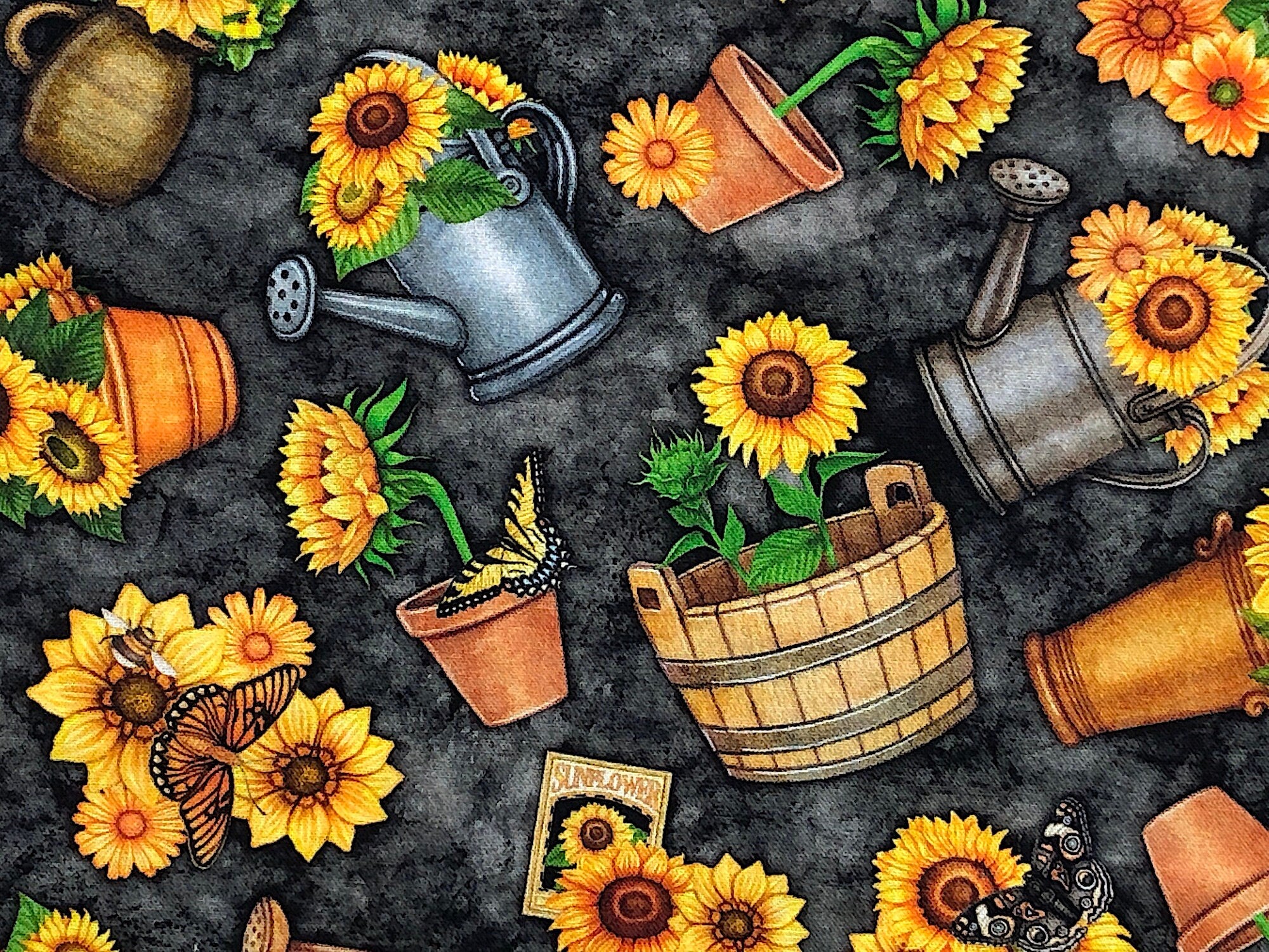 Close up of sunflowers, watering cans, butterflies and more.